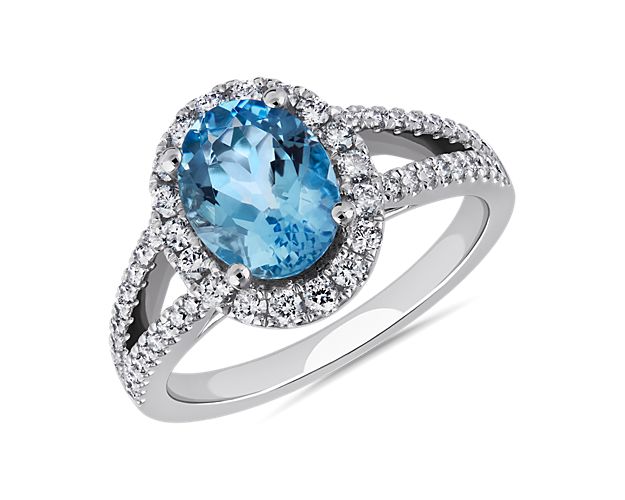 Oval Aquamarine and Diamond Halo Split Shank Ring (9x7mm)