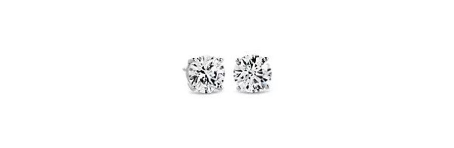 Lab diamond stud earrings set in white gold. Lab diamond stud earrings set in white gold.